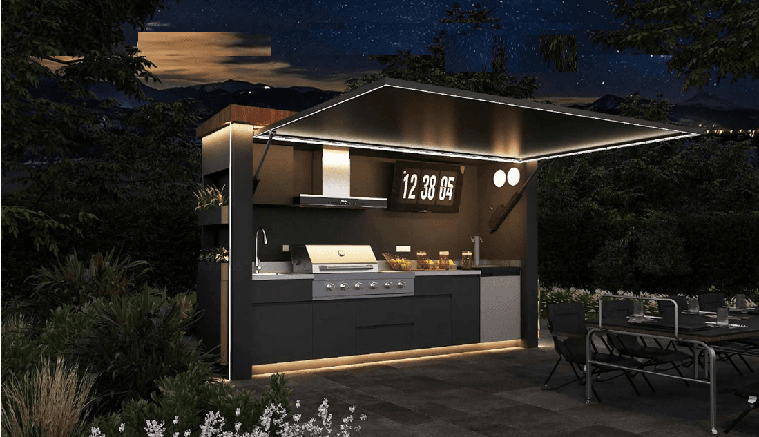 Luxury outdoor grill station at night with lighting